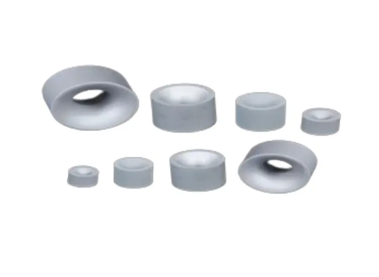 Eight various-sized cemented tungsten carbide die nibs and cores featuring highly polished, deep conical forming bores.