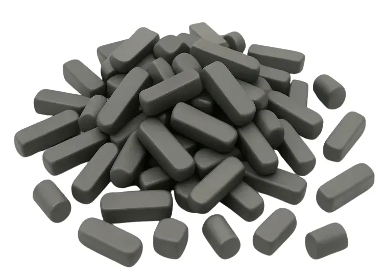 A set of tungsten carbide nibs, or inserts, used for wire drawing dies and other high-wear industrial tools.